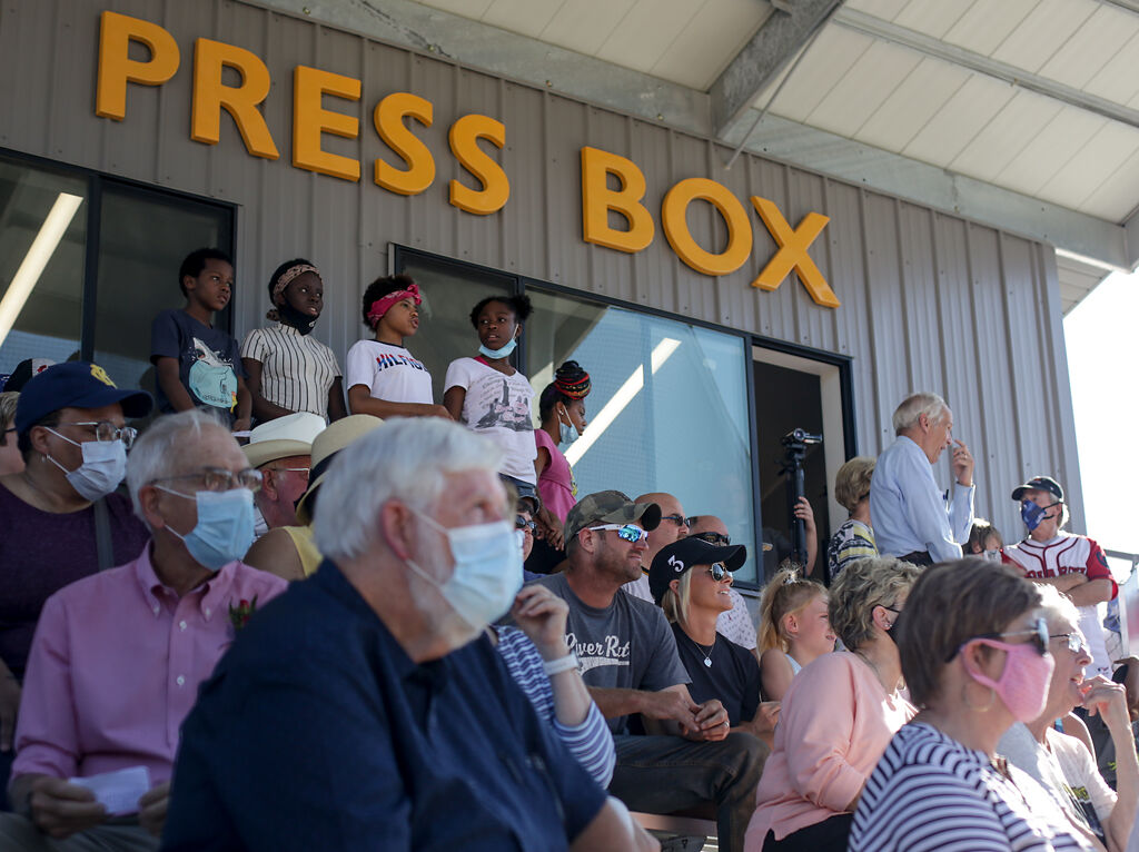 Spectators fill the newly named John Donaldson Field ahead of a dedication